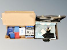 A collection of Masonic books, yearbooks, a suitcase containing Masonic medals, apron etc.