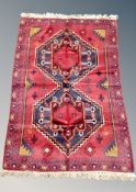 A Baluchi rug 135 cm x 90 cm