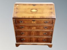 An inlaid yewwood bureau width 81 cm