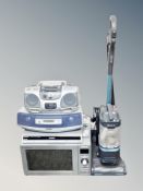 An Aiwa hifi together with Panasonic portable stereo, Panasonic dvd recorder,