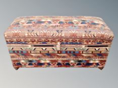 An upholstered blanket box,