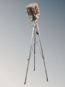 A contemporary search light on tripod base