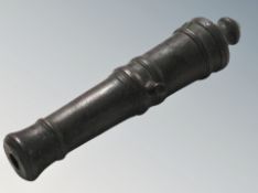 A bronze ornamental cannon barrel,