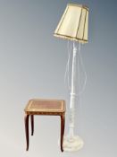 An inlaid laminated sewing table together with cream standard lamp