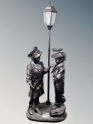 A contemporary figured floor lamp height 180 cm