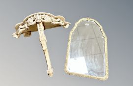 A cream and gilded console table with bevelled mirror