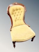 An Edwardian spoon backed nursing chair