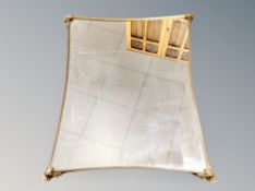 A contemporary shaped gilt metal framed mirror, 76cm by 61cm.