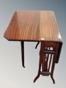 An Edwardian mahogany Sutherland table