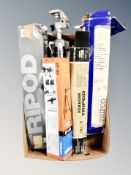 A box of five camera tripods