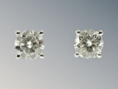 A pair of 18ct white gold diamonds stud earrings, each approximately 0.3ct.