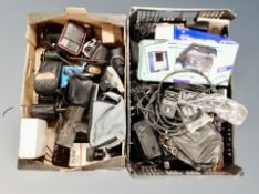 Two crates of assorted vintage and later cameras, accessories, flash,
