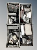 Four baskets of assorted digital and vintage cameras, cine camera,