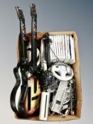 A box of Nintendo Wii console games, leads and accessories, guitars,