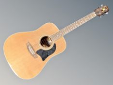 A Garrison AG-400 acoustic guitar