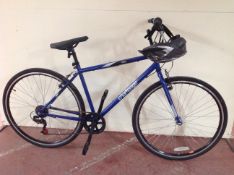 A Challenge Roam hybrid bike with helmet