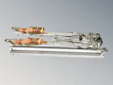 A trailer hitch with ratchet straps