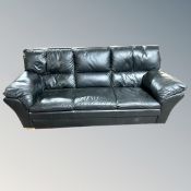 A Hjort Knudsen black leather three seater settee