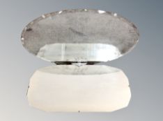 Three frameless bevelled mirrors