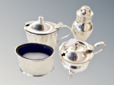 A four piece silver cruet set
