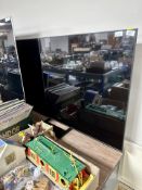 A Samsung model UE55BU8500K 55 inch LCD TV with lead and remote