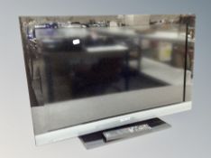 A Sony Bravia 32 inch LCD TV with remote