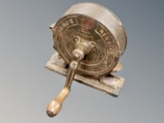 A Spong red dot cast iron knife cleaner/sharpener