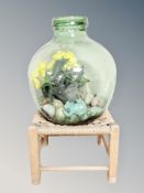 A green glass carboy, height 33 cm,