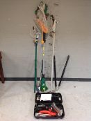 A Black and Decker electric file with accessories in case together with an electric pole saw,