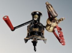 A Monitor 132 brass paraffin lamp together with a Spong wall mounted coffee mill