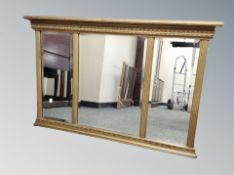 A Victorian gilt triptych overmantel mirror, 107cm by 68cm.