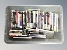 A box of Playstation II, III,