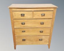 An Art Nouveau five drawer chest