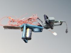 A Black and Decker GT221 electric hedge trimmer with lead together with further electric chain saw