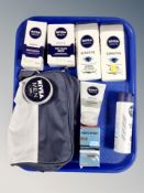 A tray of Nivea Men Moisturizer post shave balm, 2 x shower gel, face wash, deodorant, creme,