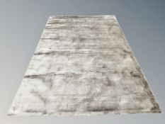 An Asiatic London Dolce silver-coloured carpet,