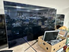 A Samsung model UE65KS800T LCD smart TV with lead and remote