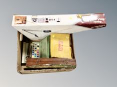 A box of balanced fluorescent light with magnifier lens, vintage Kodak movie projector,