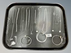 Approximately twelve assorted silver necklaces and five bracelets/bangles,