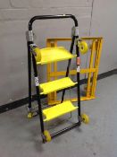 A metal piano dolly,