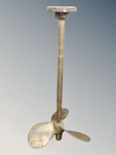 A brass boat propeller,