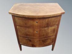 A 19th century mahogany bow fronted three drawer chest,