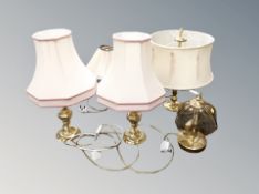 A pair of contemporary glass table lamps and three further examples