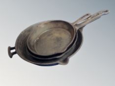 Three 19th century cast iron skillets
