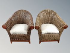 A pair of wicker conservatory armchairs