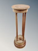 An inlaid mahogany jardiniere stand
