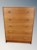 A Danish teak chest of five drawers,