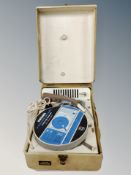 A vintage gramophone together with a radio