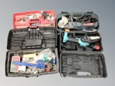 A handheld chain saw, angle grinder,