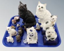 A tray of ceramic cat ornaments, pair of metal owl sifters,